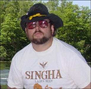 Bob Sellers in old-time hat and new-time t-shirt.